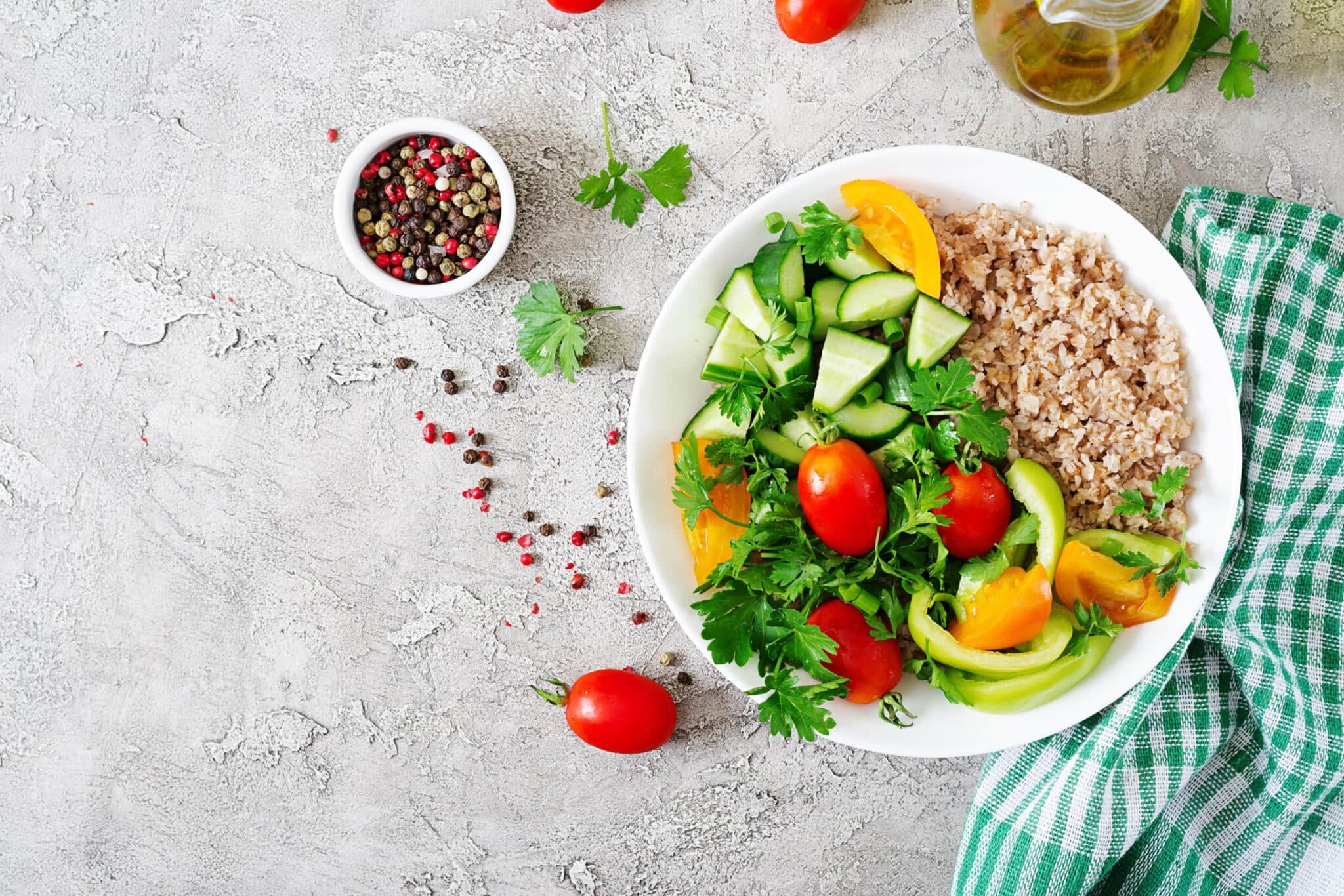 diet menu healthy vegetarian salad fresh vegetables tomatoes cucumber sweet peppers porridge bowl vegan food flat lay top view